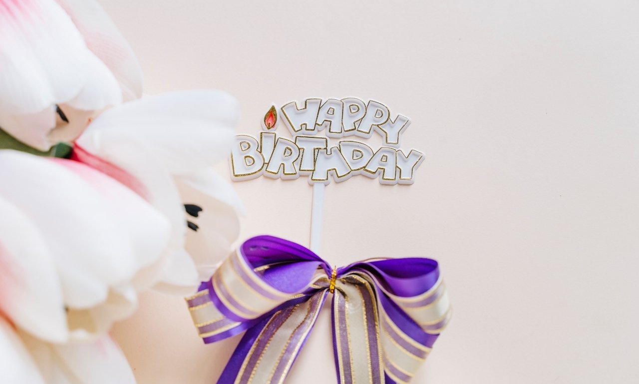 Birthday blessings filled with love and joy message card with flowers and warm light