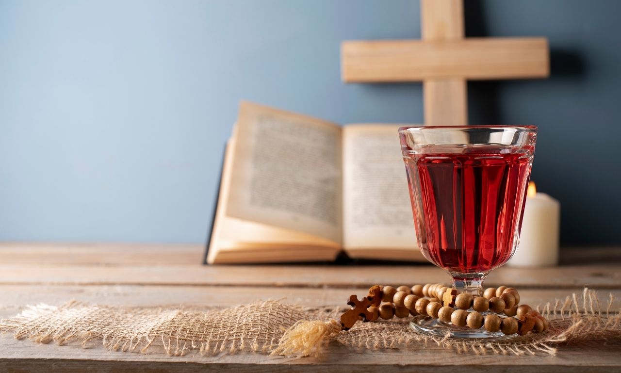 Holy Thursday blessings, prayers and quotes for reflection with candles, cross, and peaceful spiritual background