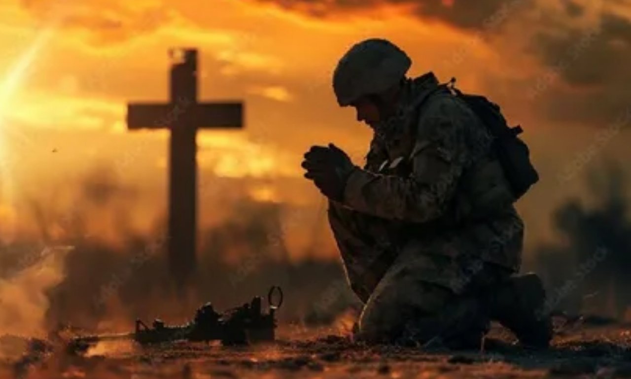 War blessings for soldiers with hands clasped in prayer over a military dog tag and folded flag