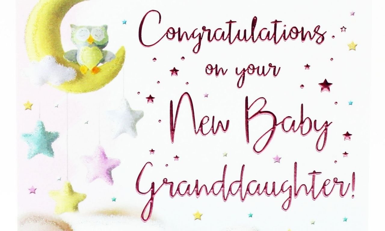 Smiling new grandmother holding her newborn grandchild with a joyful family celebrating, representing congratulations on becoming a grandma to share joy.